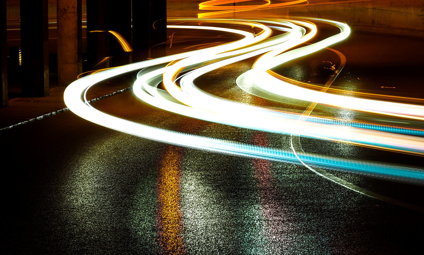 Timelapse photo of streams of light made by cars